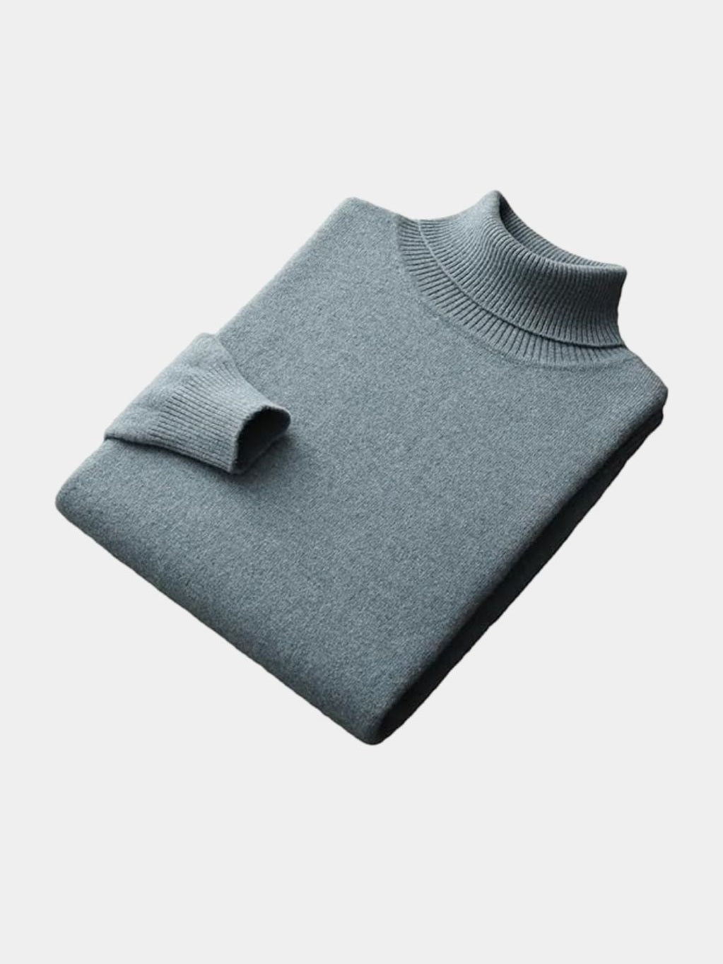 Folded green merino wool turtleneck sweater