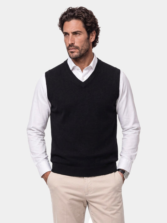 Man wearing Cross & Crown's black cashmere V-neck knit vest
