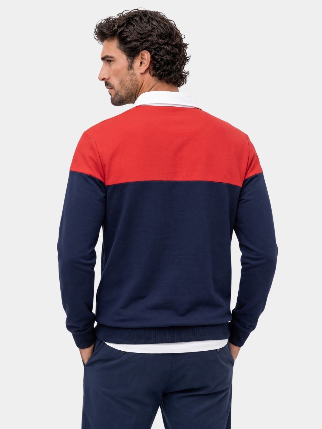 Back view of the red and navy colorblock rugby polo