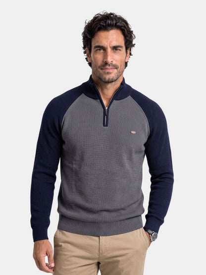 Man wearing gray and navy colorblock waffle-knit quarter-zip Cross & Crown