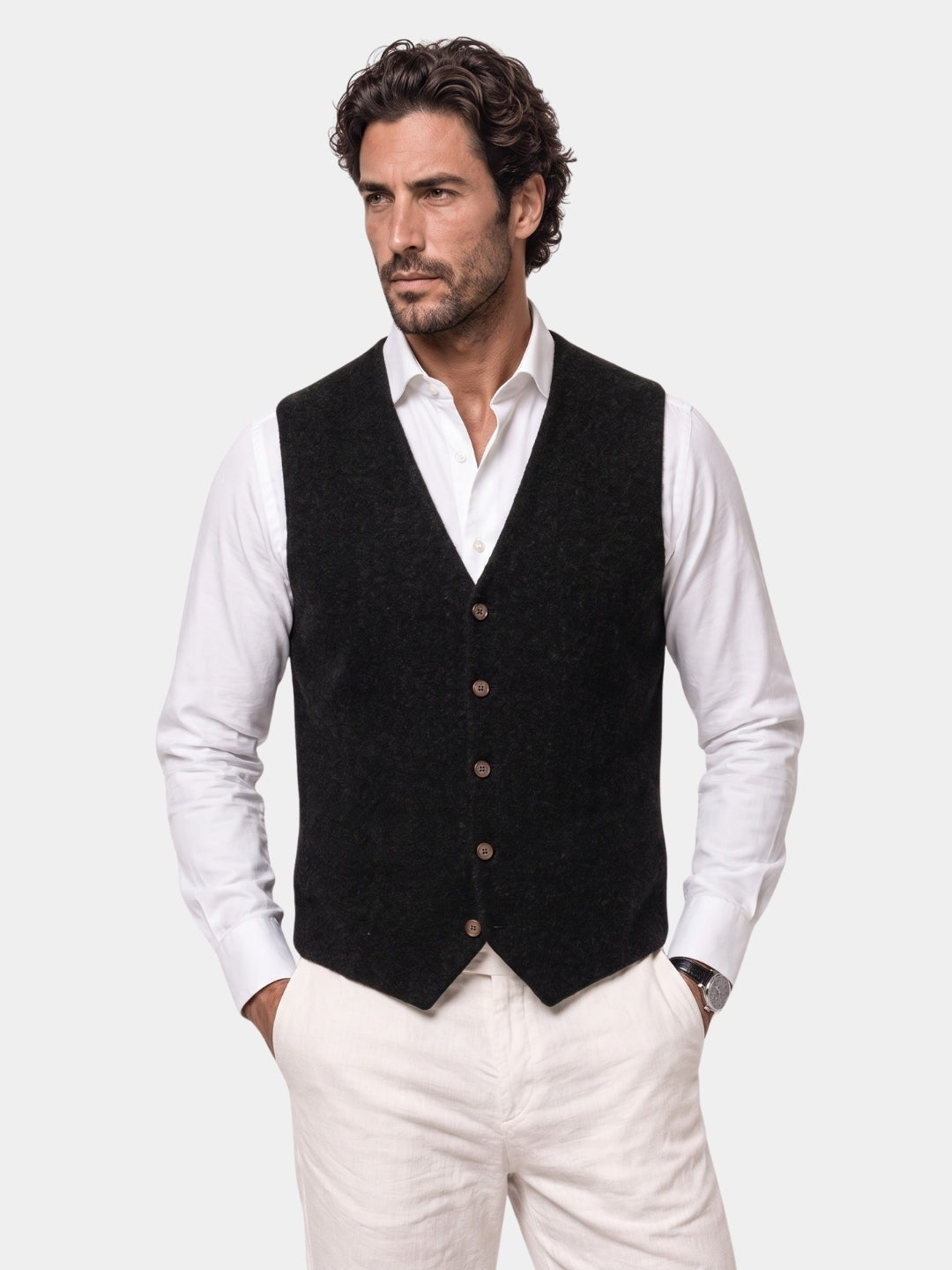 Man wearing Cross & Crown's black button-up cashmere cardigan vest