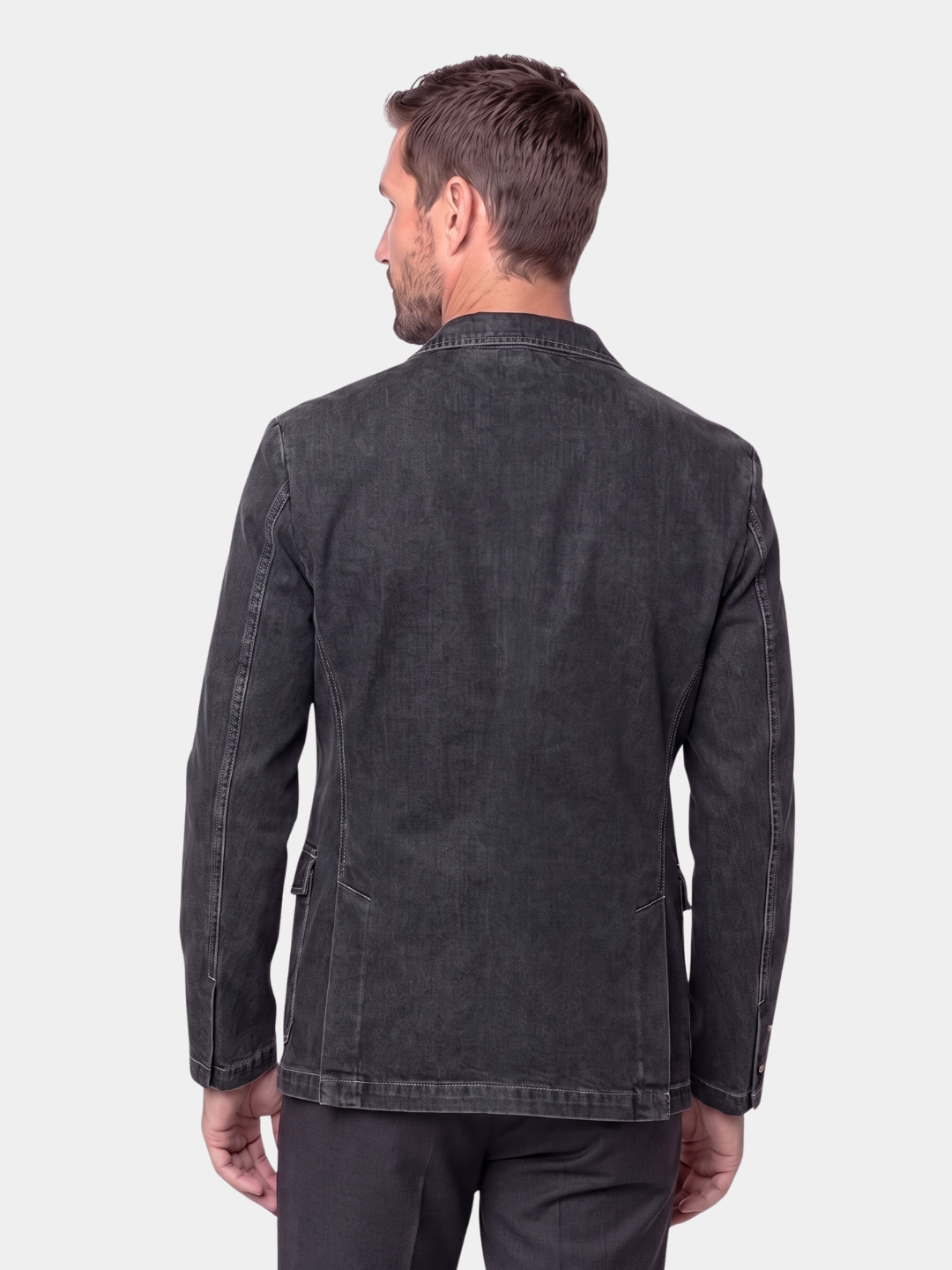 Back view of the man wearing the black denim blazer