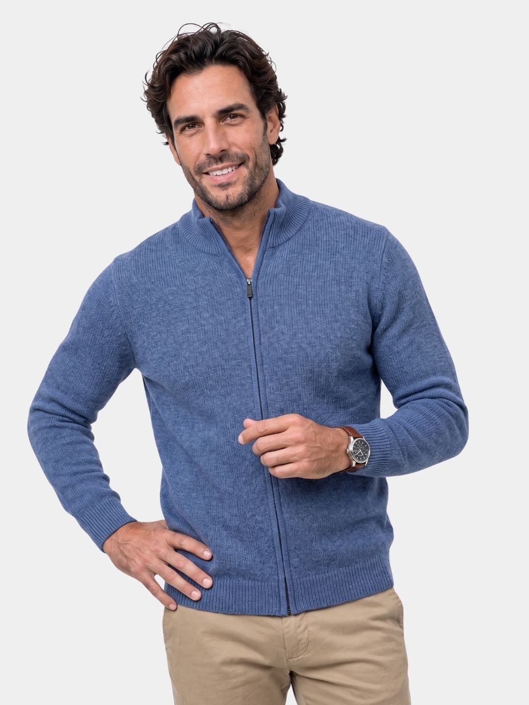 Man wearing a blue full-zip cashmere sweater with stand collar