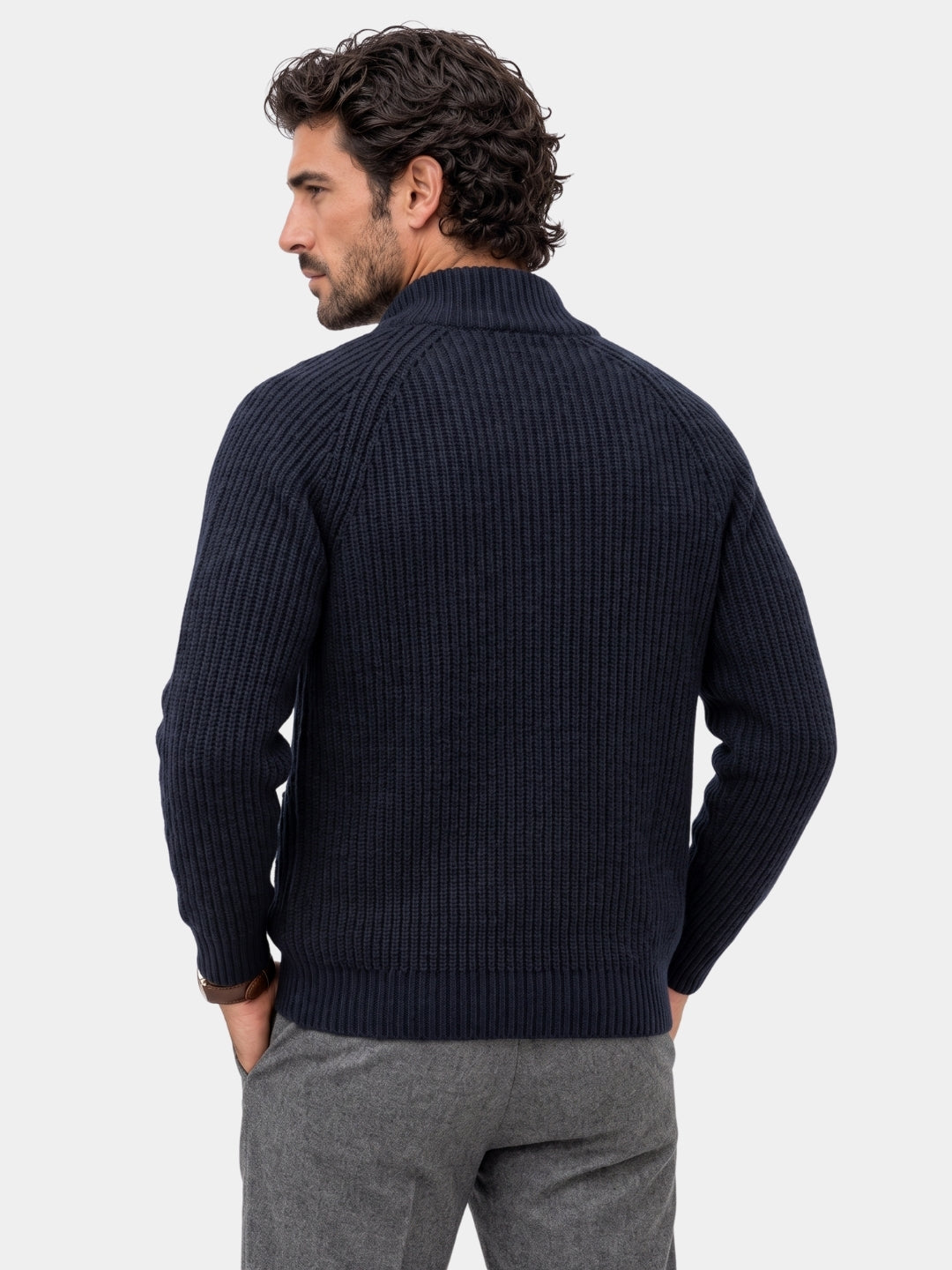 Back view of the navy shawl-collar knit jacket showing the ribbed knit