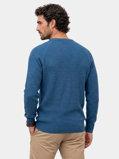 Back view of the blue waffle-knit crew neck jumper