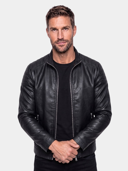 Cross & Crown man wearing black leather racer jacket