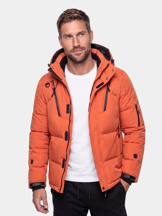 Man wearing orange down-filled hooded puffer jacket Cross & Crown