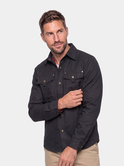 Cross & Crown man wearing the black flannel-lined snap jacket