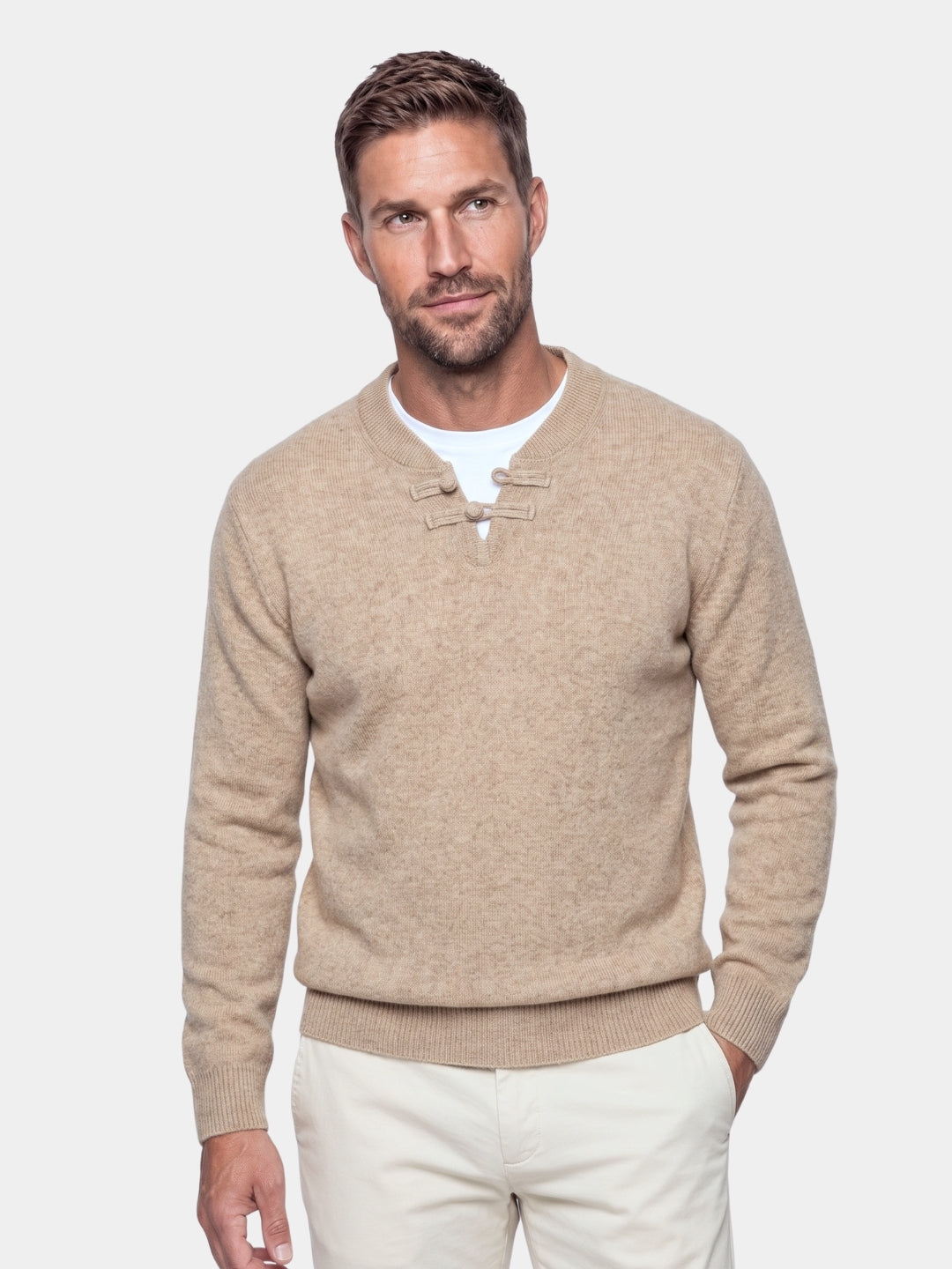 Man wearing the camel toggle-button merino cashmere sweater