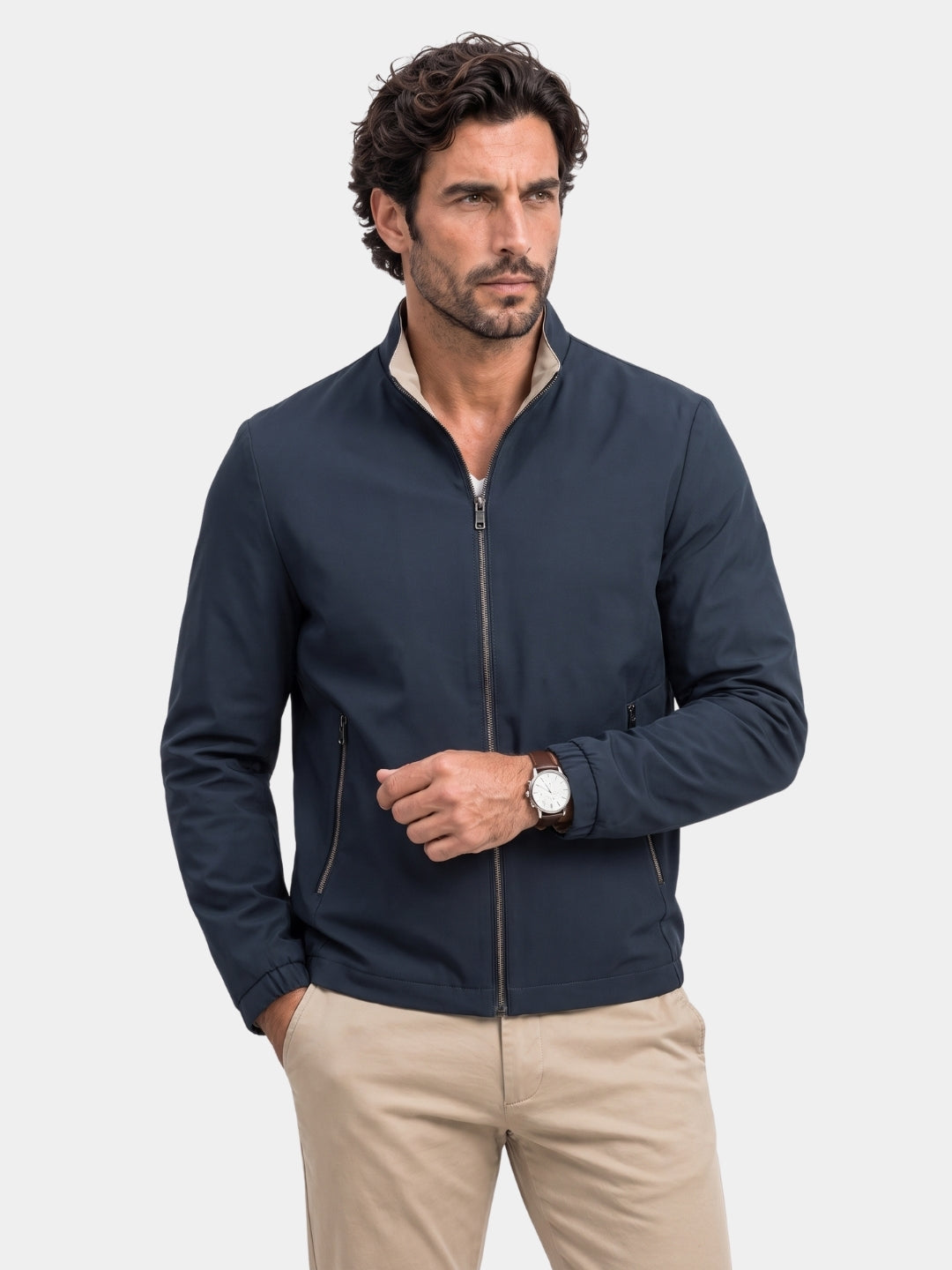Man wearing navy Lucien zip jacket, front view, Cross & Crown