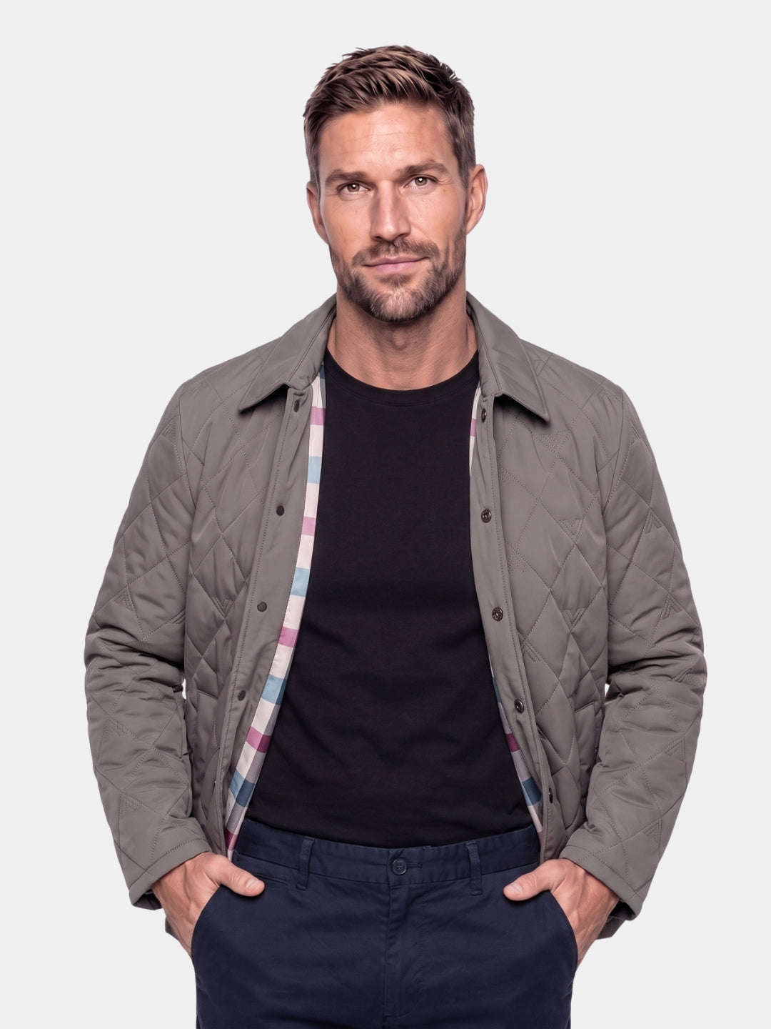 Man wearing a gray quilted chore jacket, Cross & Crown