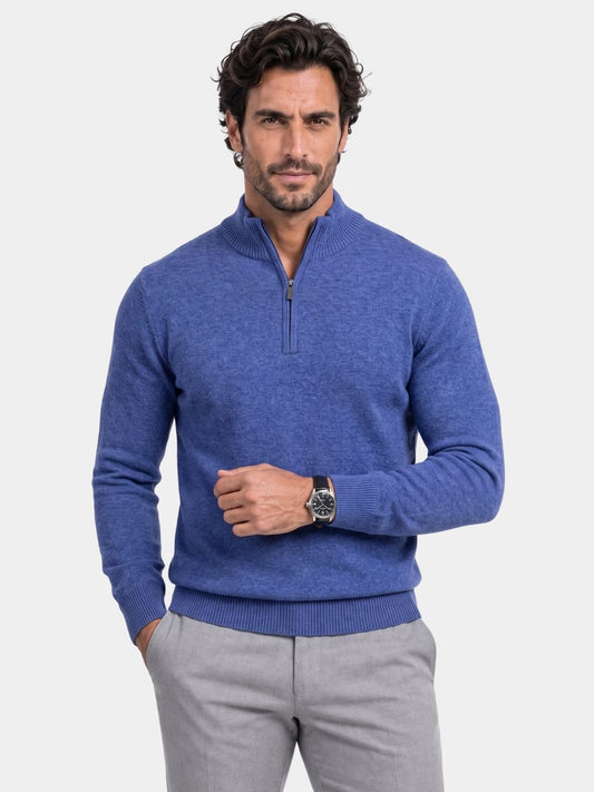 Man wearing a blue merino wool half zip sweater, Cross & Crown