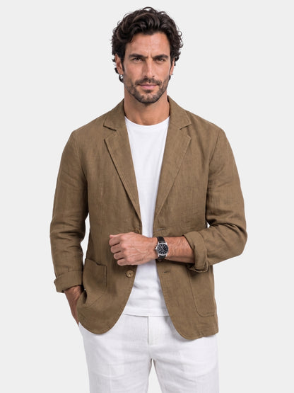 Man wearing the Cross & Crown coffee-brown linen blazer