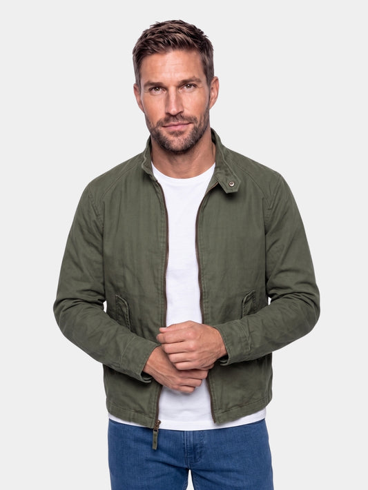 Man wearing the army green grid-textured field jacket