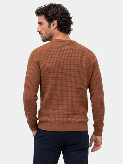 Back view of the rust brown waffle-knit crew neck sweater