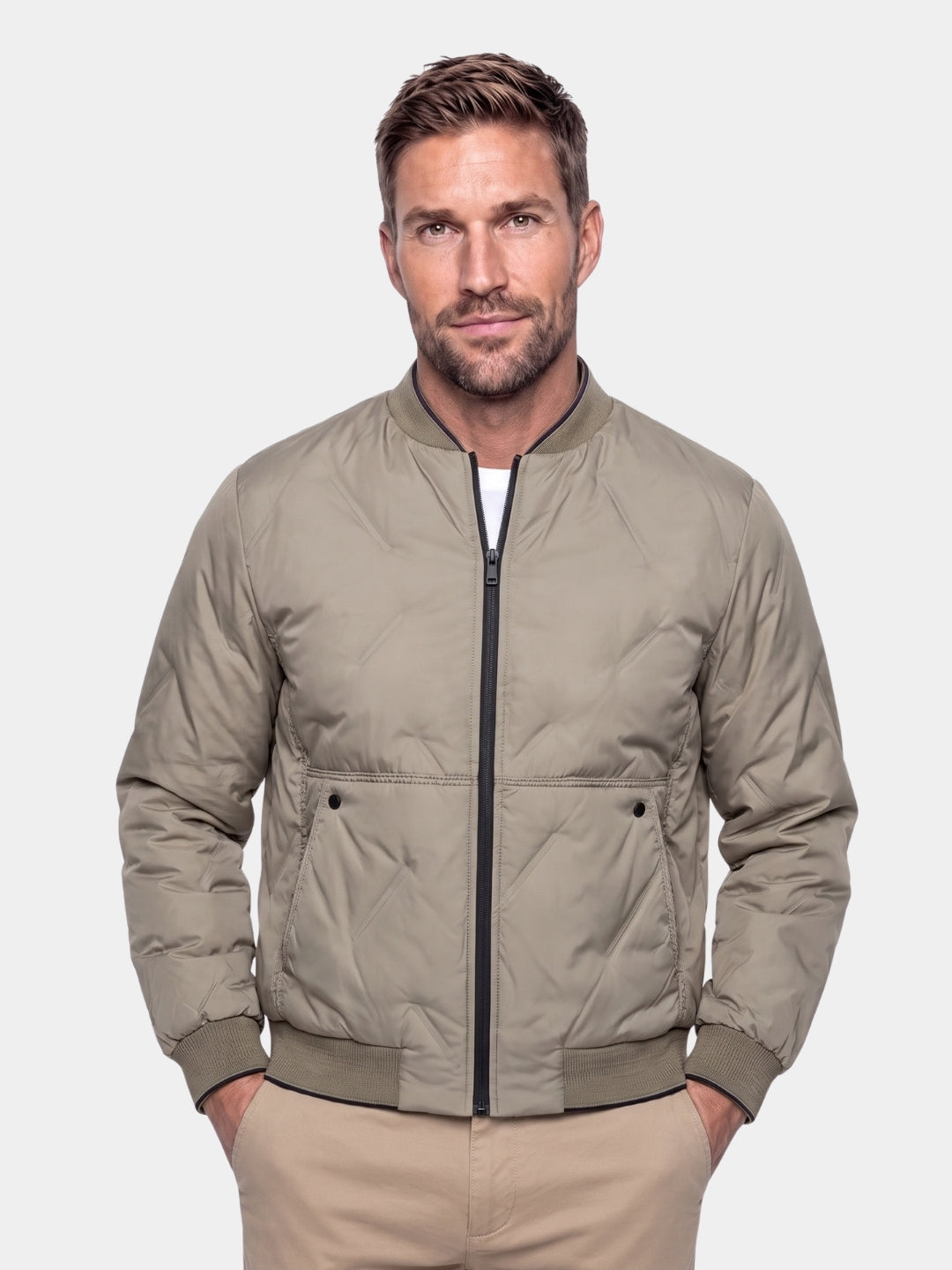 Man wearing khaki Savoy quilted bomber jacket, front view, Cross & Crown