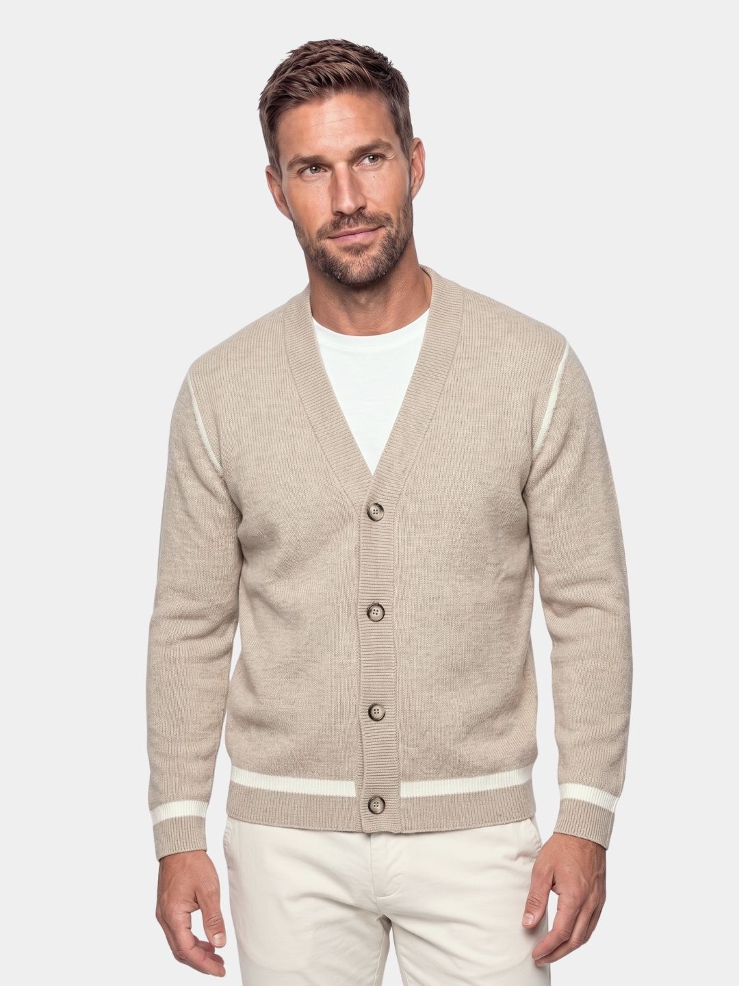 Man wearing beige button-front cardigan with striped trim, front view, Cross & Crown