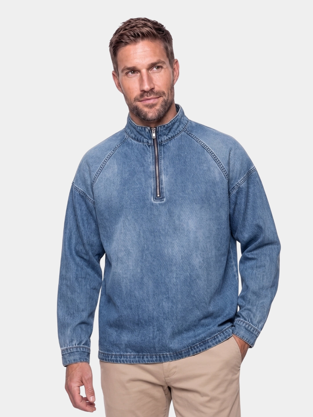 Cross & Crown man wearing the stonewash denim quarter-zip pullover
