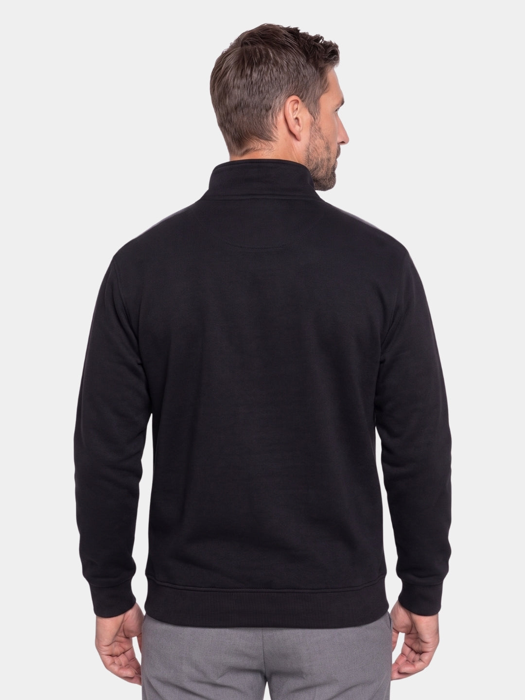 Back view of the black ribbed quarter-zip sweatshirt