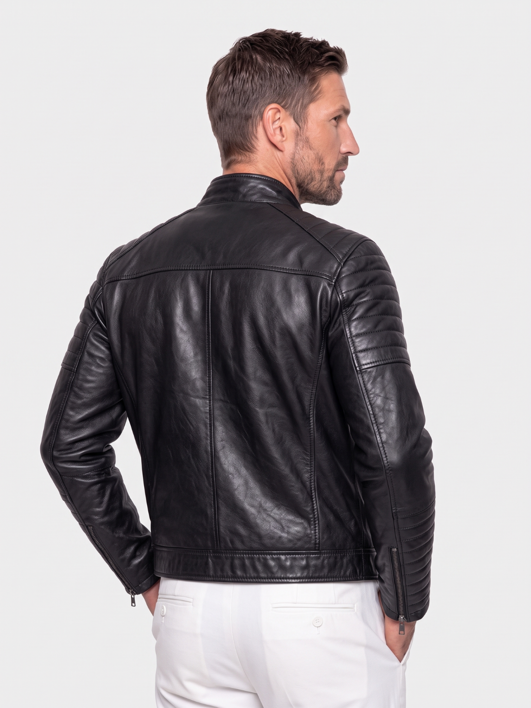 Back view of black diamond-stitch leather jacket