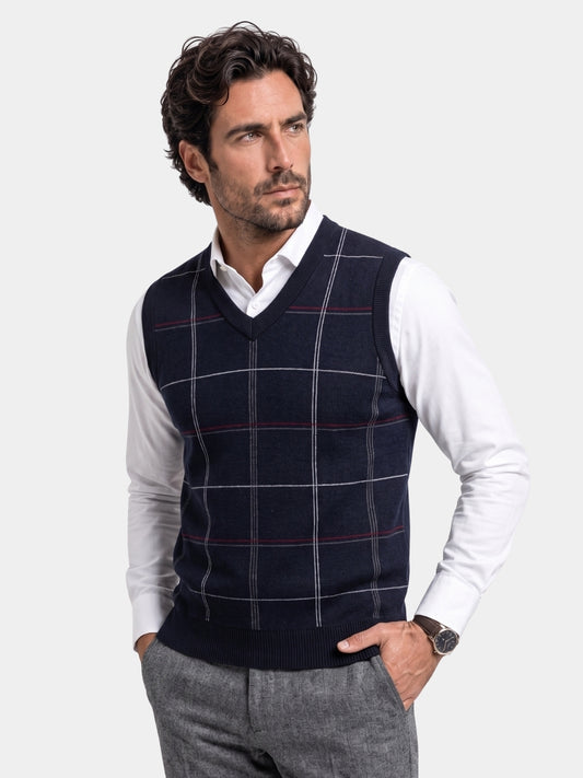 Cross & Crown windowpane check knit vest in navy on a model.