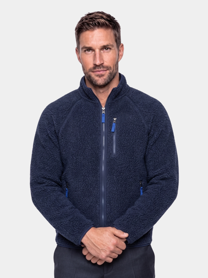 Man wearing navy sherpa jacket Cross & Crown, front view