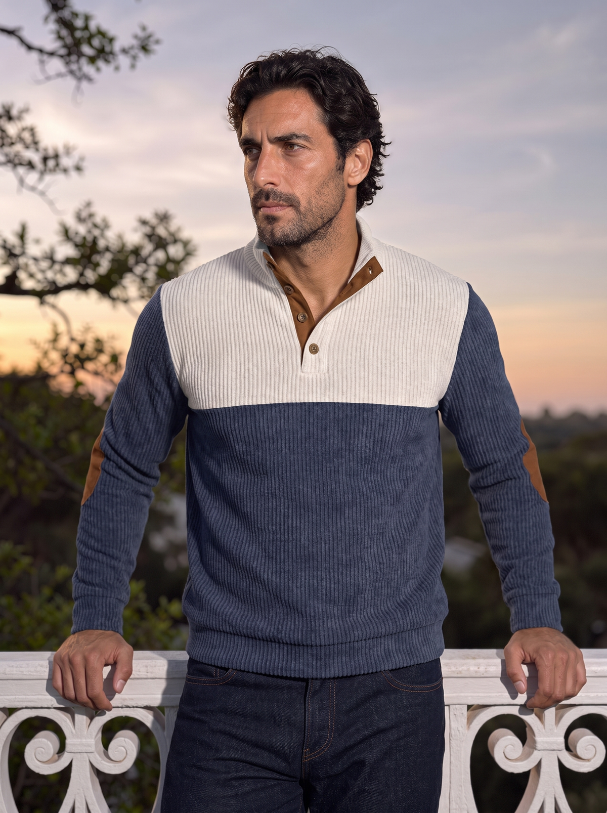 Navy corduroy pullover worn with dark jeans outdoors