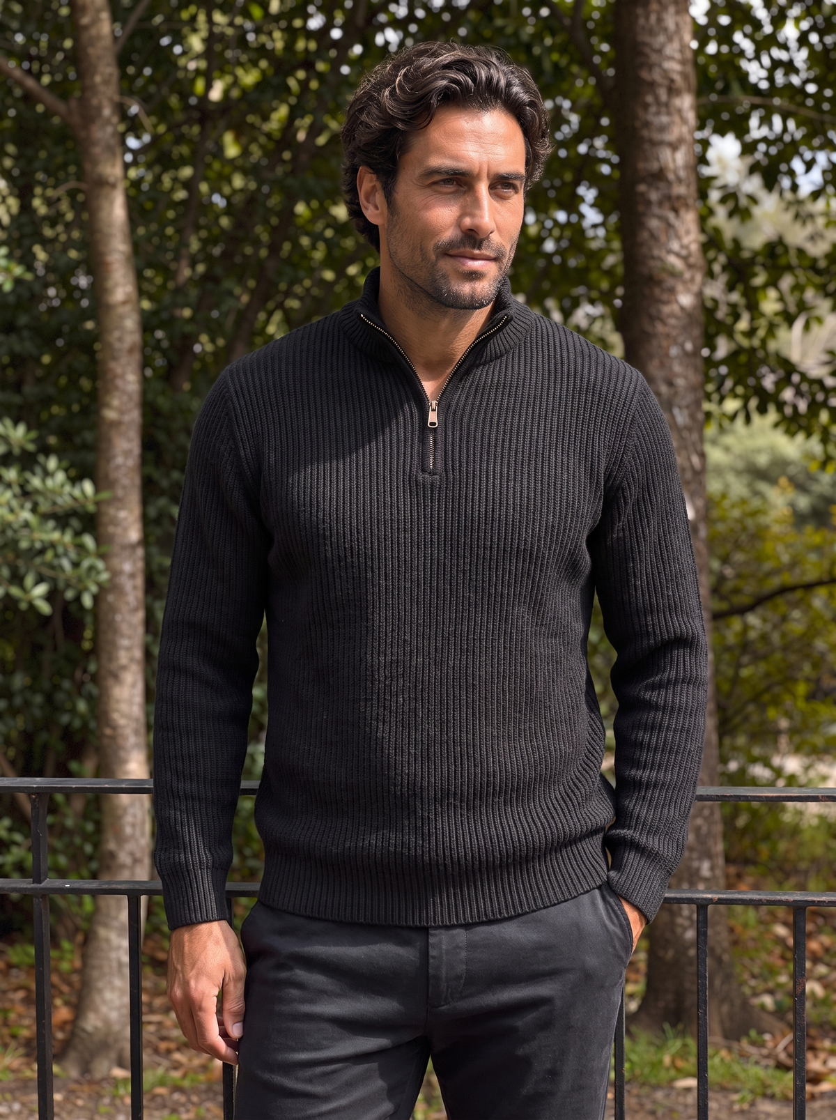 Man wearing the charcoal ribbed wool sweater outdoors
