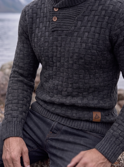 Close-up of the charcoal shawl collar and button placket