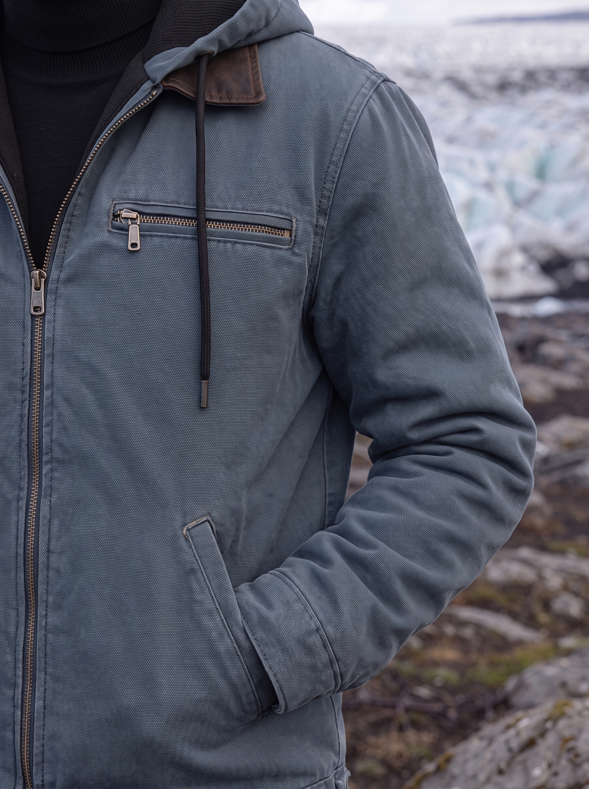 Close-up of the chest zip pocket and contrast collar trim