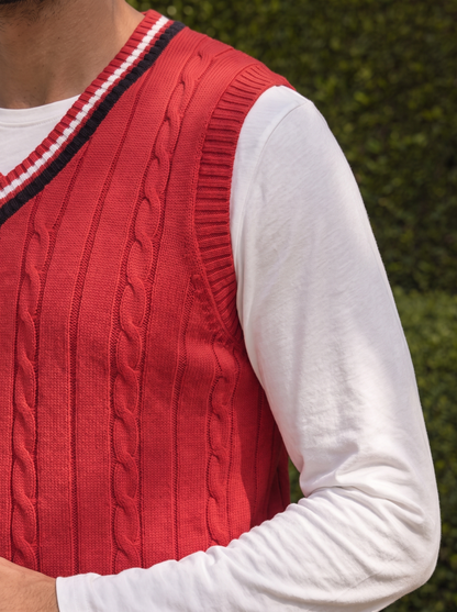 Close-up of the striped trim on the red cricket vest.